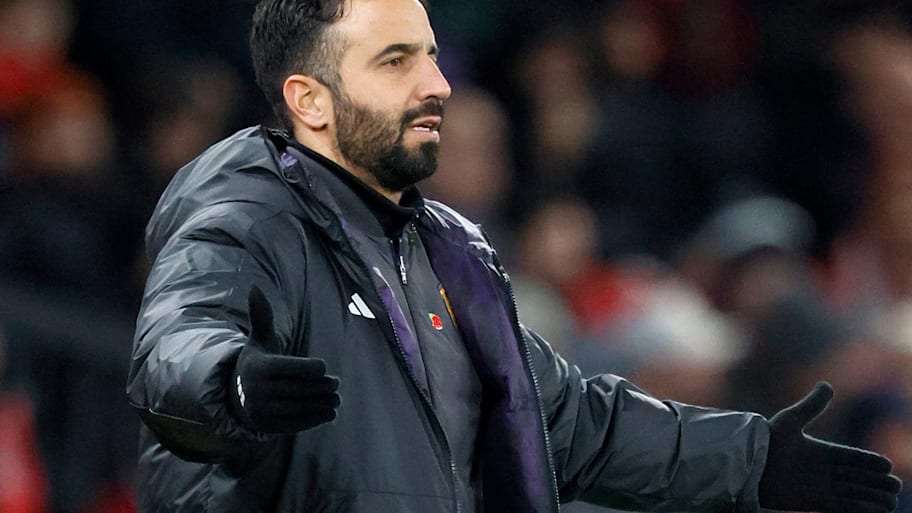 Ruben Amorim with arms outstretched.