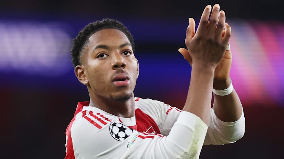 Myles Lewis-Skelly clapping.