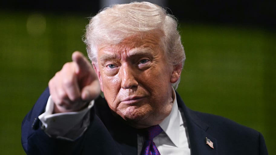 President Donald Trump pointing.