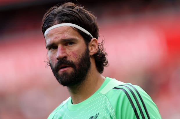 Alisson in action for Liverpool.