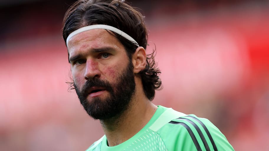 Alisson in action for Liverpool.