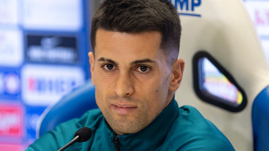 João Cancelo smiling.