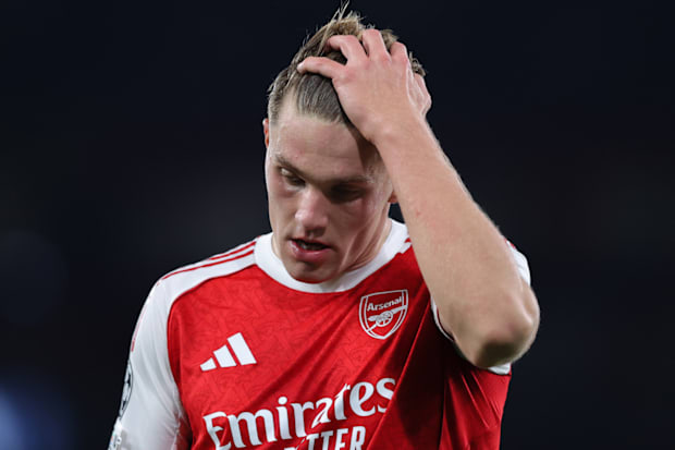 Viktor Gyökeres running his hand through his hair.