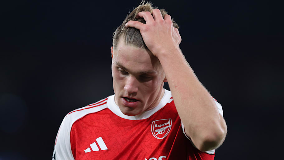 Viktor Gyökeres running his hand through his hair.