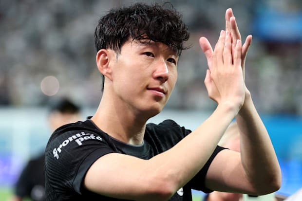 Tearful Son Heung-min applauding fans.