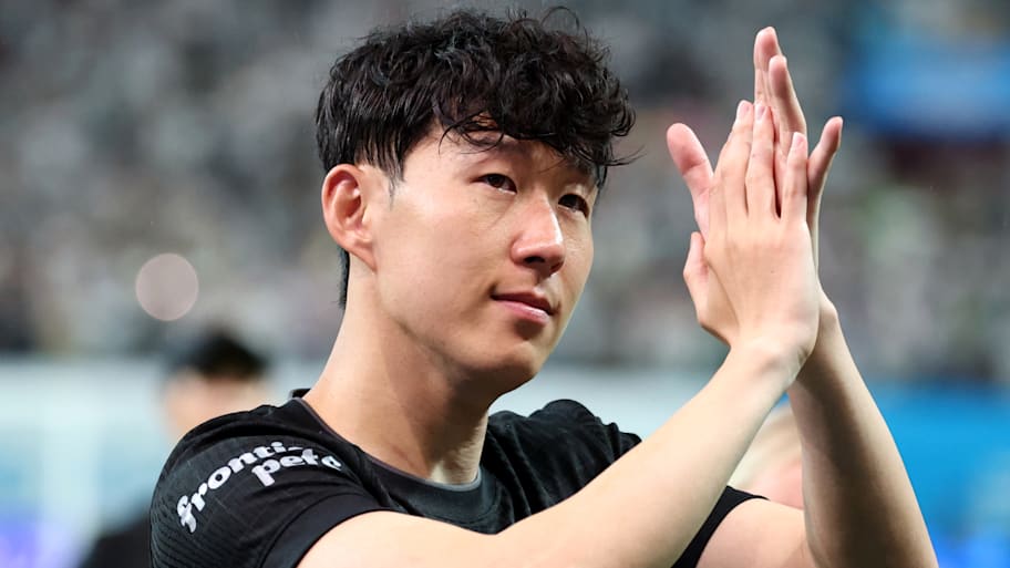 Tearful Son Heung-min applauding fans.