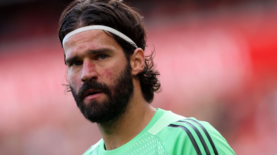 Alisson in action for Liverpool.