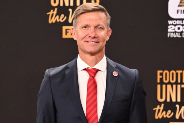 Jesse Marsch smiling uneasily.