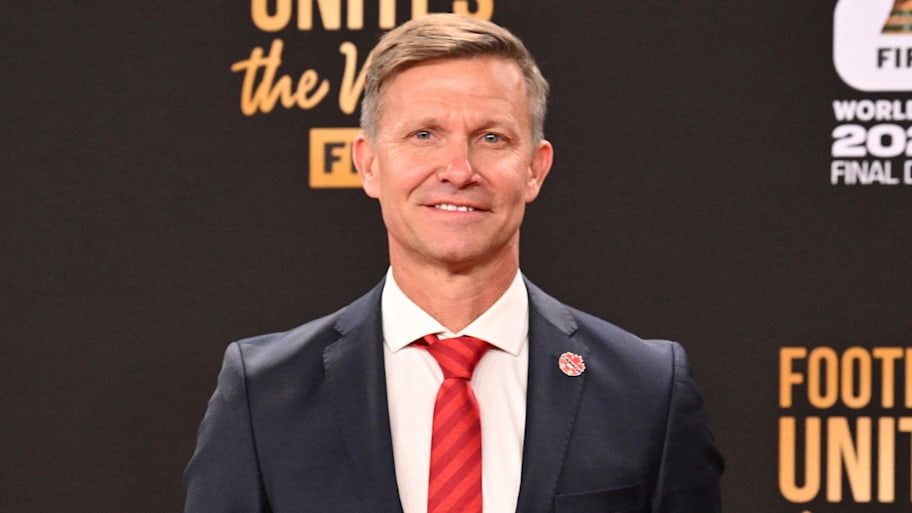 Jesse Marsch smiling uneasily.