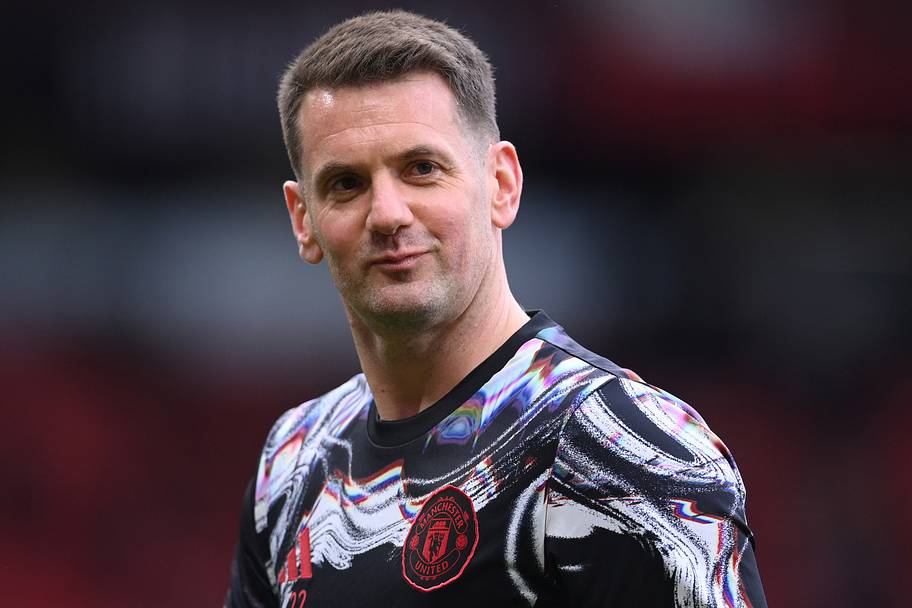 Tom Heaton slyly smiling.