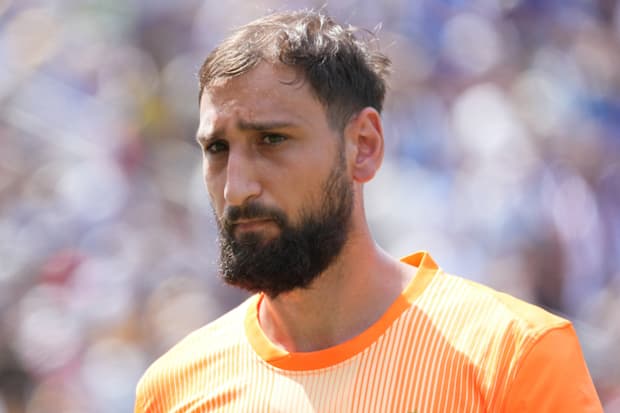 Gianluigi Donnarumma looking pained.