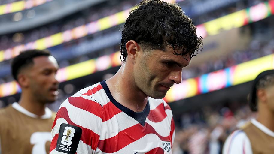 Christian Pulisic with his head bowed.