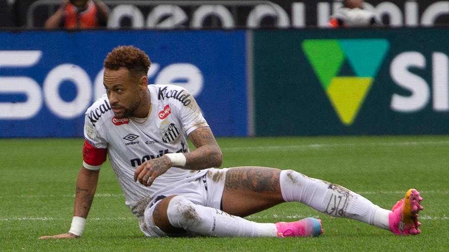 Neymar prostrate on the turf.