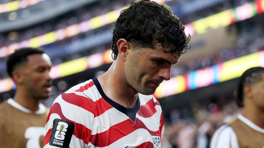 Christian Pulisic with his head bowed.