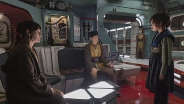 Star Wars: The Acolyte Episode 3 "Destiny." Indara (Carrie-Anne Moss), Sol (Lee Jung-jae), Young Osha (Lauren Brady). Image credit: StarWars.com