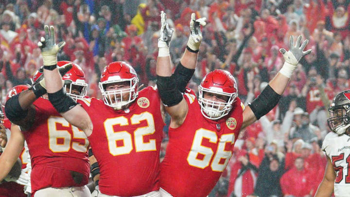 Nov 4, 2024; Kansas City, Missouri, USA; Kansas City Chiefs running back Kareem Hunt (29) scores the game-winning touchdown against the Tampa Bay Buccaneers as guard Joe Thuney (62) and guard Mike Caliendo (66) celebrate during the game at GEHA Field at Arrowhead Stadium. Mandatory Credit: Denny Medley-Imagn Images