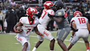 Galena Park North Shore quarterback Kaleb Maryland runs the ball in a Week 1 game against Dallas South Oak Cliff. 