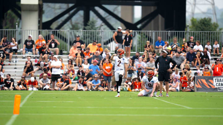 Cincinnati Bengals kicker Evan McPherson watches his kick at Cincinnati Bengals training camp on the Kettering Health Practice Fields in Cincinnati on Friday, Aug. 2, 2024.