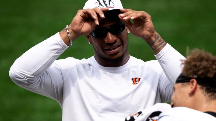 Cincinnati Bengals wide receiver Ja'Marr Chase (1) adjusts his cap during Cincinnati Bengals practice at Paycor Stadium on Thursday, Aug. 8, 2024.