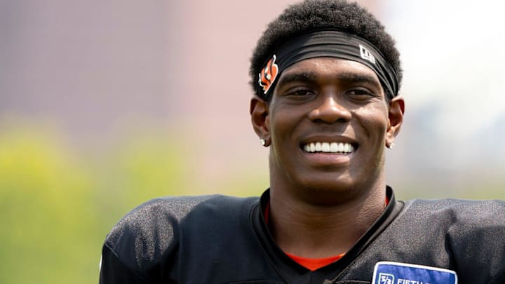 Cincinnati Bengals cornerback Cam Taylor-Britt (29) smiles at Cincinnati Bengals training camp on the Kettering Health Practice Fields in Cincinnati on Sunday, Aug. 4, 2024.