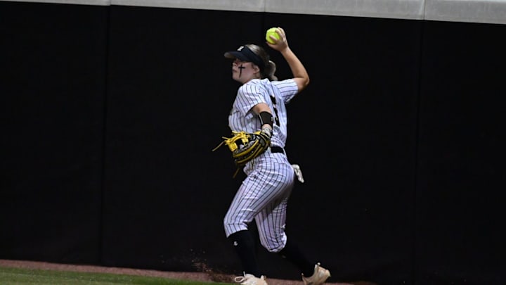 Hernando Tigers Molly Anderson (5) fields a ball at the warning track during game two of the Class 7A MHSAA Softball Championships between Northwest Rankin
and Hernando at the University of Southern Miss Softball Complex in Hattiesburg, Miss., on Thursday, May 16, 2024. Hernando Tigers Molly Anderson (5) fields a ball at the warning track during game two of the Class 7A MHSAA Softball Championships between Northwest Rankin
and Hernando at the University of Southern Miss Softball Complex in Hattiesburg, Miss., on Thursday, May 16, 2024.