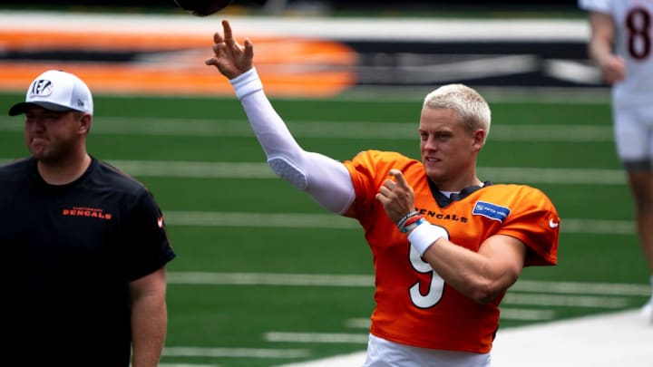 Cincinnati Bengals quarterback Joe Burrow (9) throws a ball during Cincinnati Bengals practice at Paycor Stadium on Thursday, Aug. 8, 2024.