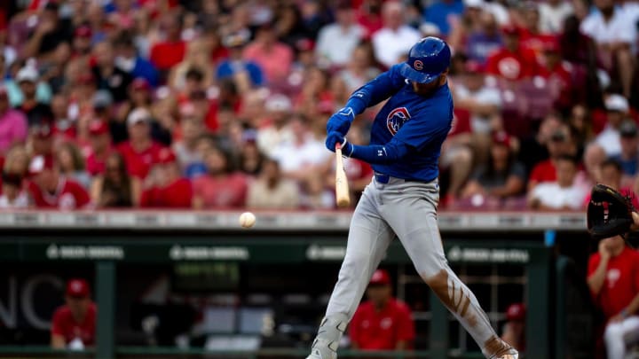 Chicago Cubs designated hitter Cody Bellinger (2) hits a base hit in the third inning of the MLB game between the Cincinnati Reds and the Chicago Cubs at Great American Ballpark in Cincinnati on Wednesday, July 31, 2024.