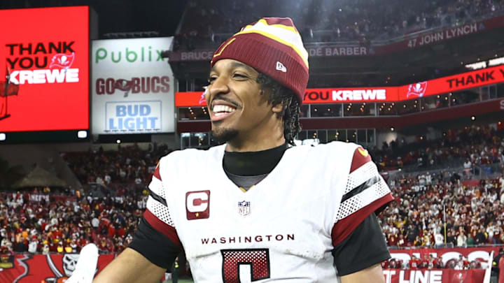 Jan 12, 2025; Tampa, Florida, USA; Washington Commanders quarterback Jayden Daniels (5) celebrates with wide receiver Terry McLaurin (17) after winning a NFC wild card playoff against the Tampa Bay Buccaneers at Raymond James Stadium. Mandatory Credit: Kim Klement Neitzel-Imagn Images Jan 12, 2025; Tampa, Florida, USA; Washington Commanders quarterback Jayden Daniels (5) celebrates with wide receiver Terry McLaurin (17) after winning a NFC wild card playoff against the Tampa Bay Buccaneers at Raymond James Stadium. Mandatory Credit: Kim Klement Neitzel-Imagn Images