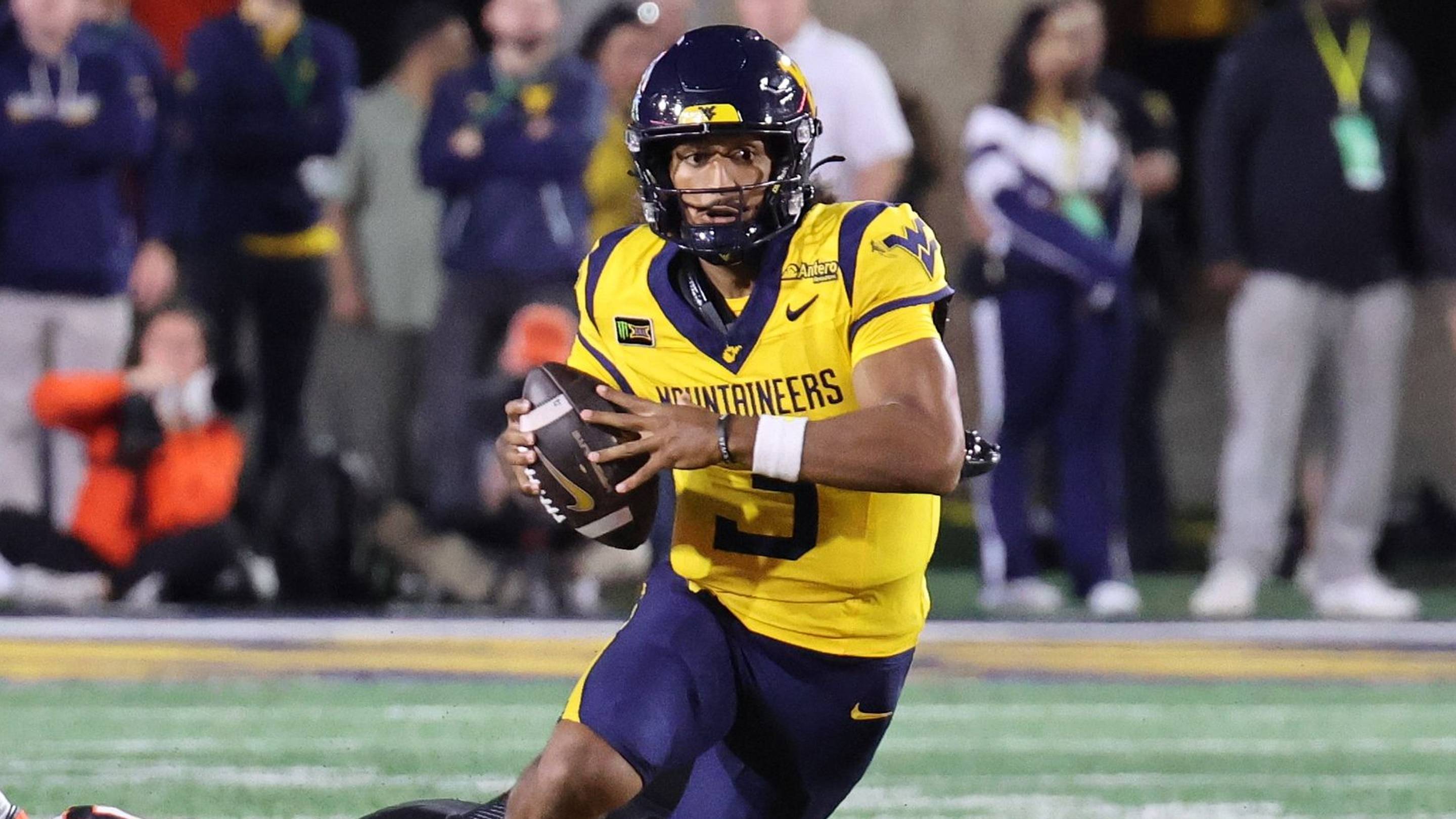 West Virginia University quarterback Mike Hawkins Jr. | Christopher Hall - West Virginia on SI