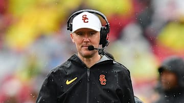 Nov 15, 2025; Los Angeles, California, USA; Southern California Trojans head coach Lincoln Riley watches game action against the Iowa Hawkeyes during the first half at the Los Angeles Memorial Coliseum. Mandatory Credit: Gary A. Vasquez-Imagn Images
