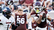 Mississippi State wide receiver Anthony Evans III sprints away from Northern Illinois defensive back Ty Myles in Saturday's game.