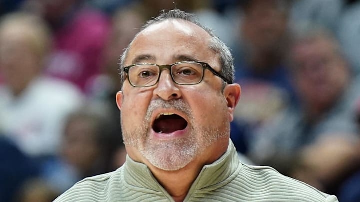 South Florida Bulls head coach Jose Fernandez watches from the sideline as they take on the UConn Huskies.