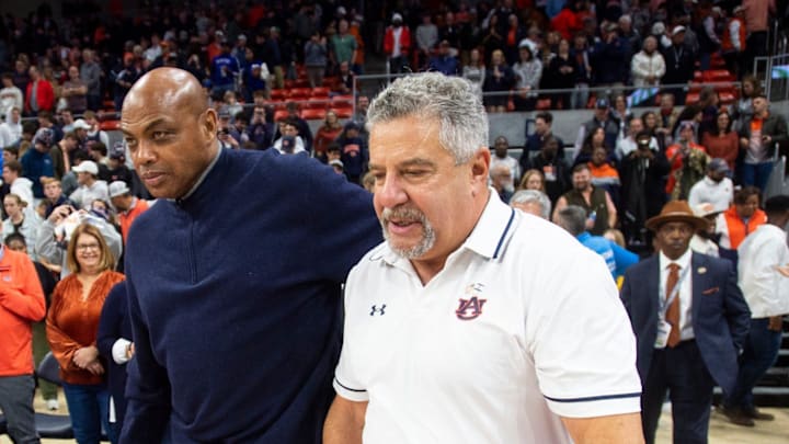 Former Auburn basketball player Charles Barkley and Auburn Tigers head coach Bruce Pearl take the court after the game as Auburn Tigers take on USC Trojans at Neville Arena in Auburn, Ala., on Sunday, Dec. 17, 2023. Auburn Tigers defeated USC Trojans 91-75.