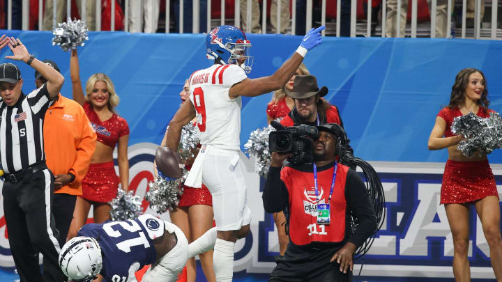 Dec 30, 2023; Atlanta, GA, USA; Mississippi Rebels wide receiver Tre Harris (9) reacts after a catch against the Penn State Nittany Lions in the first quarter at Mercedes-Benz Stadium. Mandatory Credit: Brett Davis-USA TODAY Sports