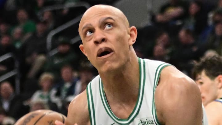 Apr 3, 2026; Milwaukee, Wisconsin, USA;  Boston Celtics forward Jordan Walsh (27) looks for a shot against Milwaukee Bucks forward Pete Nance (35) in the fourth quarter at Fiserv Forum. Mandatory Credit: Benny Sieu-Imagn Images