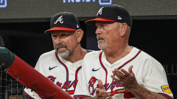 Jul 1, 2025; Cumberland, Georgia, USA; Atlanta Braves manager Brian Snitker (43) shown reacting in the dugout during the game against the Los Angeles Angels during the seventh inning at Truist Park. Mandatory Credit: Dale Zanine-Imagn Images