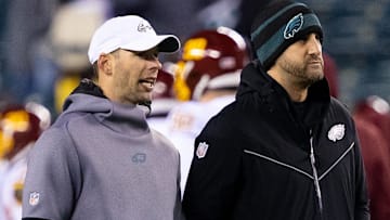 Dec 21, 2021; Philadelphia, Pennsylvania, USA; Philadelphia Eagles head coach Nick Sirianni (R) and defensive coordinator Jonathan Gannon (L) before action against the Washington Football Team at Lincoln Financial Field. Mandatory Credit: Bill Streicher-Imagn Images