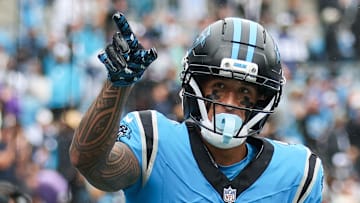Carolina Panthers wide receiver Tetairoa McMillan (4) celebrates a touchdown against the Dallas Cowboys.