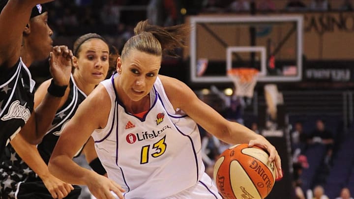 Aug 26, 2010; Phoenix, AZ, USA; Phoenix Mercury forward Penny Taylor (13) drives the ball against the San Antonio Silver Stars during the first half in game one of the Western Conference semi-finals in the 2010 WNBA playoffs at US Airways Center.  Mandatory Credit: Jennifer Stewart-Imagn Images