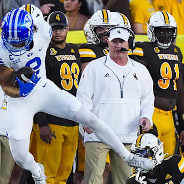 Sep 14, 2024; Laramie, Wyoming, USA; Brigham Young Cougars wide receiver Chase Roberts (2) makes a catch against the Wyoming Cowboys during the first quarter at Jonah Field at War Memorial Stadium. Mandatory Credit: Troy Babbitt-Imagn Images