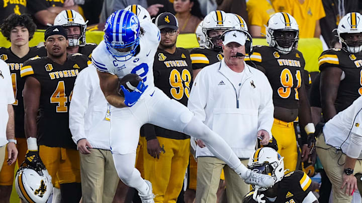 Sep 14, 2024; Laramie, Wyoming, USA; Brigham Young Cougars wide receiver Chase Roberts (2) makes a catch against the Wyoming Cowboys during the first quarter at Jonah Field at War Memorial Stadium. Mandatory Credit: Troy Babbitt-Imagn Images