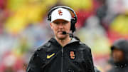 Nov 15, 2025; Los Angeles, California, USA; Southern California Trojans head coach Lincoln Riley watches game action against the Iowa Hawkeyes during the first half at the Los Angeles Memorial Coliseum. Mandatory Credit: Gary A. Vasquez-Imagn Images