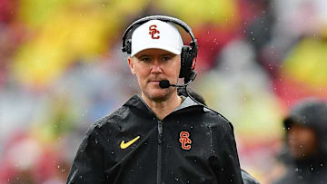 Nov 15, 2025; Los Angeles, California, USA; Southern California Trojans head coach Lincoln Riley watches game action against the Iowa Hawkeyes during the first half at the Los Angeles Memorial Coliseum. Mandatory Credit: Gary A. Vasquez-Imagn Images