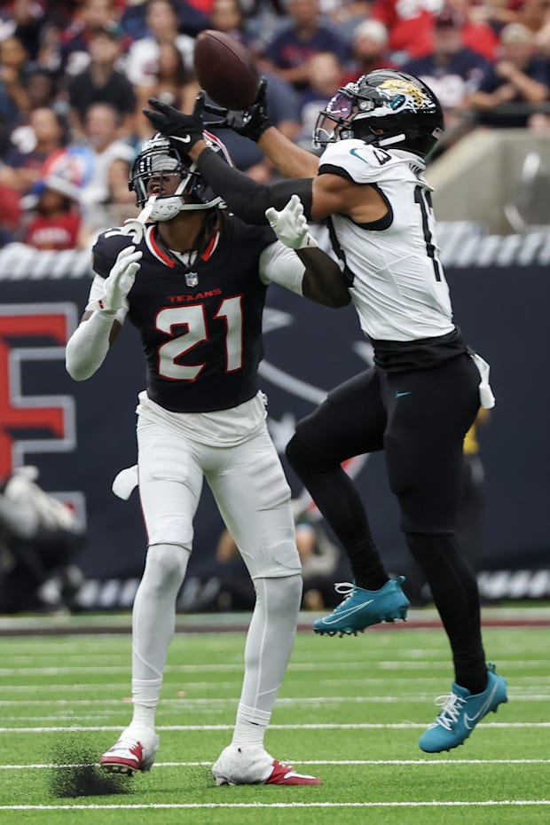 Houston Texans safety Calen Bullock (21) breaks up a pass intended for Jacksonville Jaguars wide receiver Christian Kirk (13)