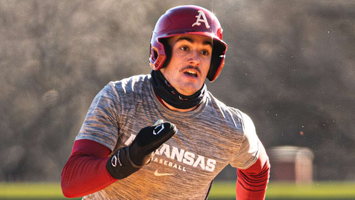 Arkansas third baseman Brent Iredale (10) runs the bases in the first spring scrimmage. 