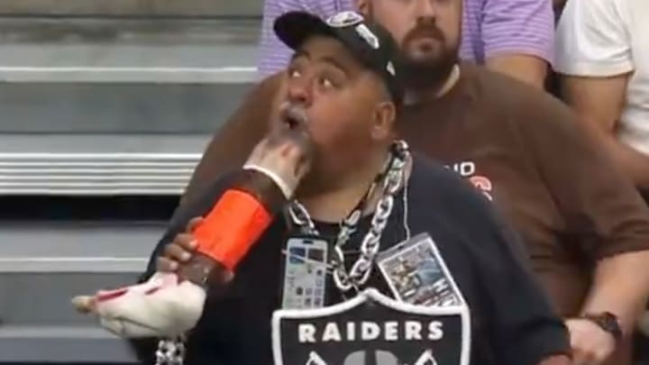 Raiders fan treats himself to some fine dining. Raiders fan treats himself to some fine dining.