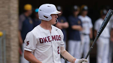 Okemos shortstop Caleb Bonemer (2) at bat against Grand Ledge in the District Final Saturday, June 1, 2024.