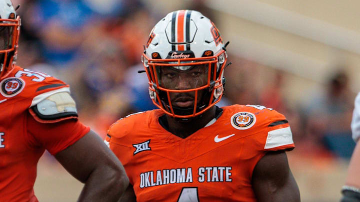 Aug 31, 2024; Stillwater, Oklahoma, USA; Oklahoma State Cowboys linebacker Nick Martin (4) ready for a play during the fourth quarter against the South Dakota State Jackrabbits at Boone Pickens Stadium. Mandatory Credit: William Purnell-Imagn Images