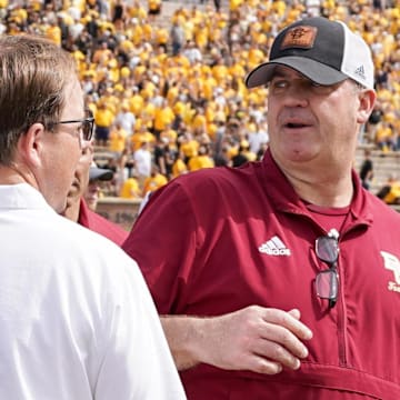 Sep 14, 2024; Columbia, Missouri, USA; Missouri Tigers head coach Eli Drinkwitz talks with Boston College Eagles head coach Bill O'Brien after the game at Faurot Field at Memorial Stadium. Mandatory Credit: Denny Medley-Imagn Images