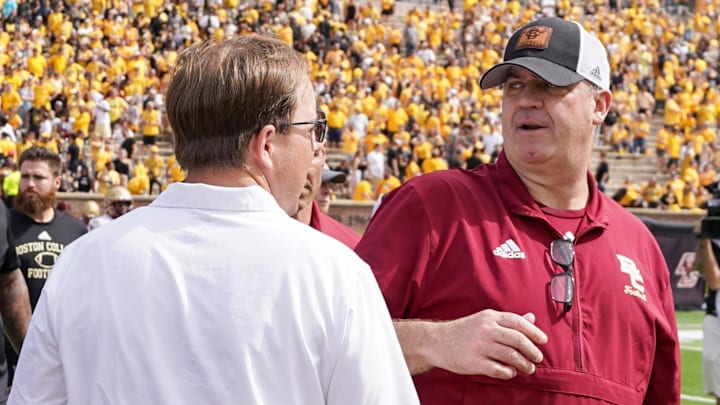 Sep 14, 2024; Columbia, Missouri, USA; Missouri Tigers head coach Eli Drinkwitz talks with Boston College Eagles head coach Bill O'Brien after the game at Faurot Field at Memorial Stadium. Mandatory Credit: Denny Medley-Imagn Images